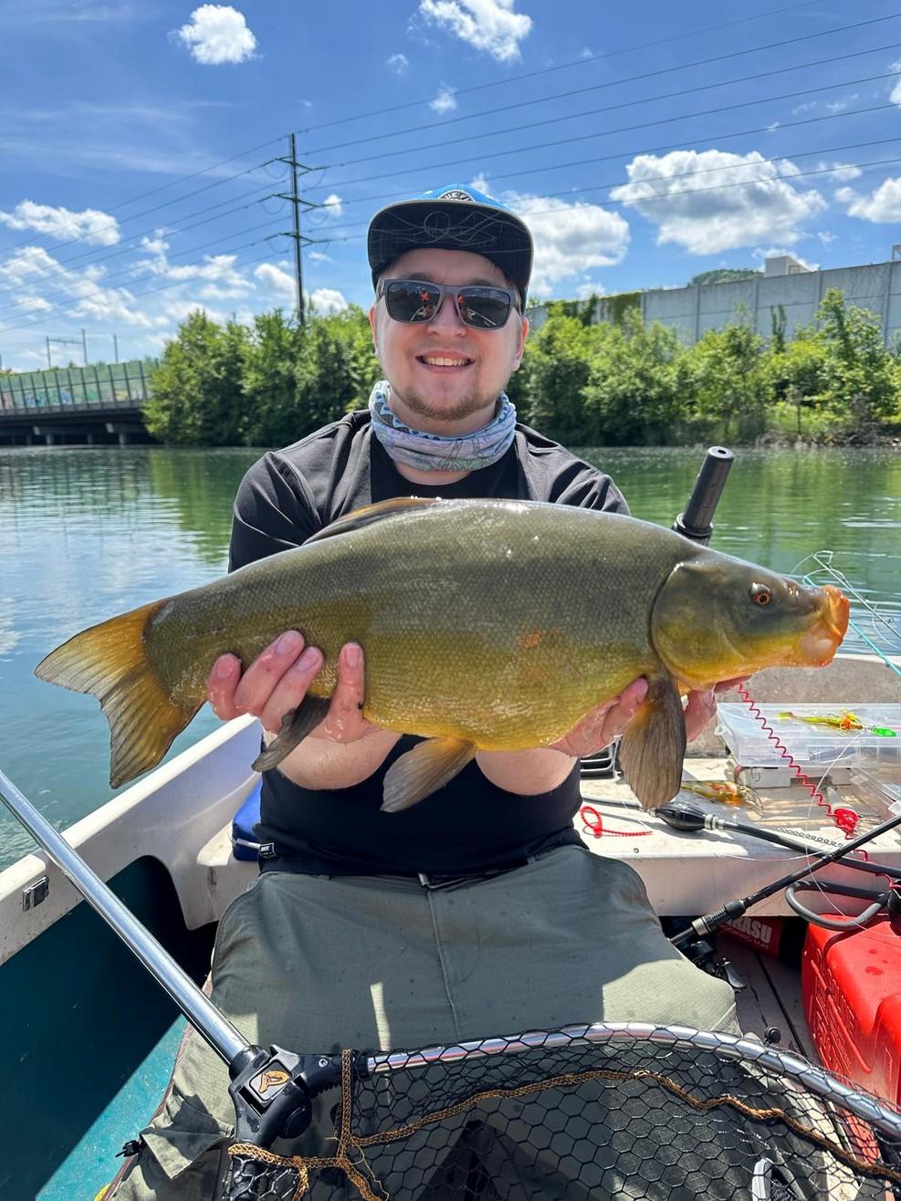 Der Leiter mit einem Fisch
